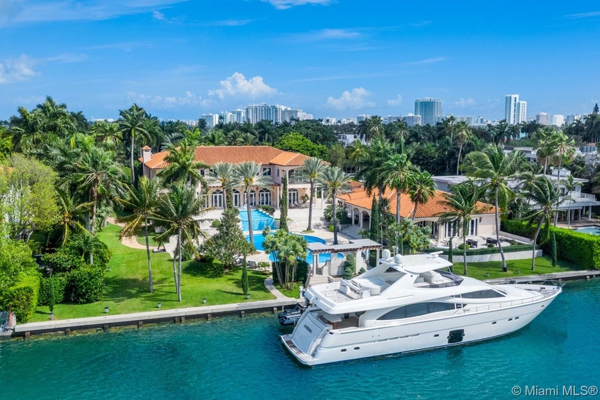 Remarkable palatial waterfront estate on guard gated for sale in Palm Island. 